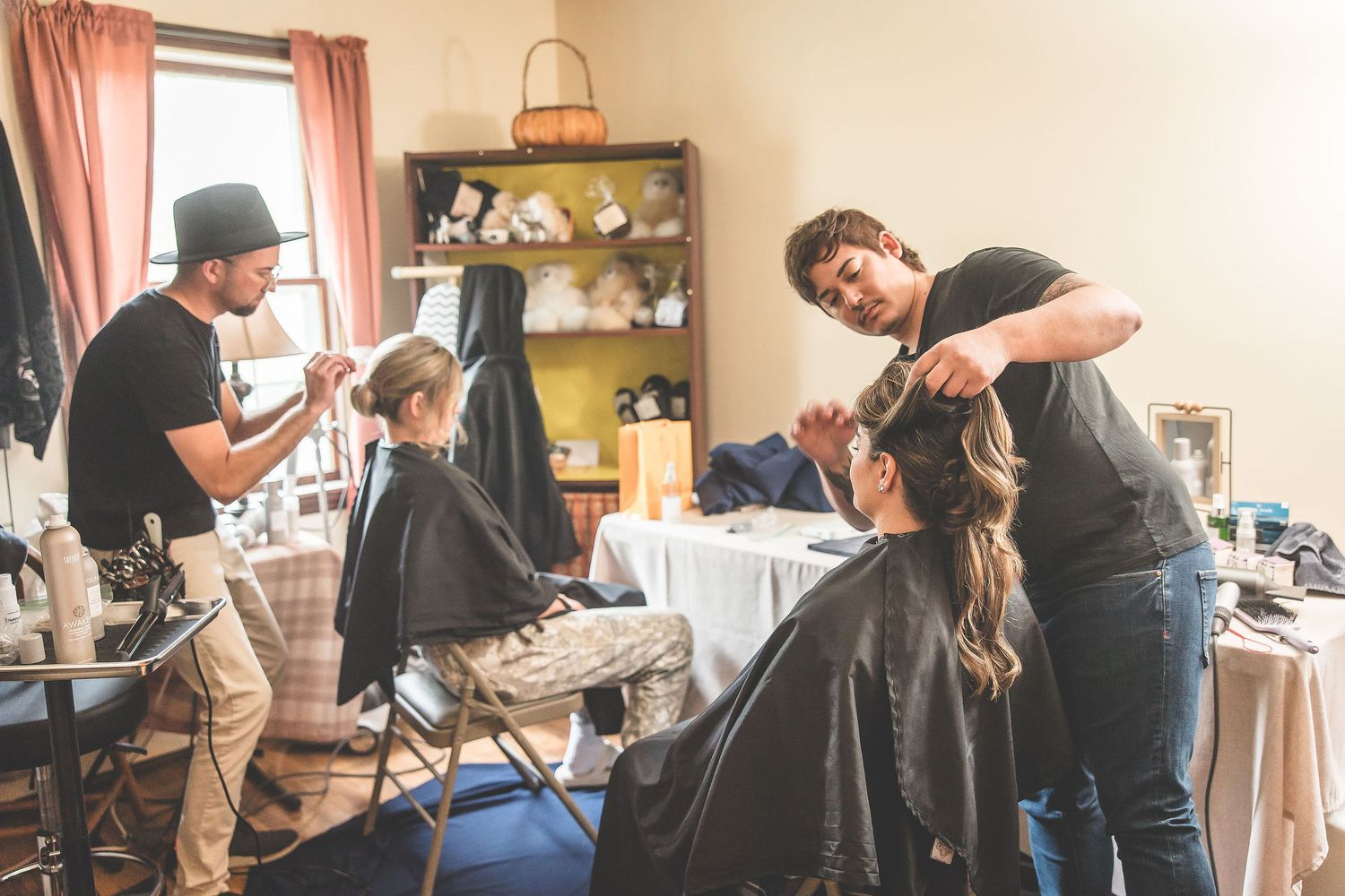 Wedding day preparation scenes with styling and grooming moments.