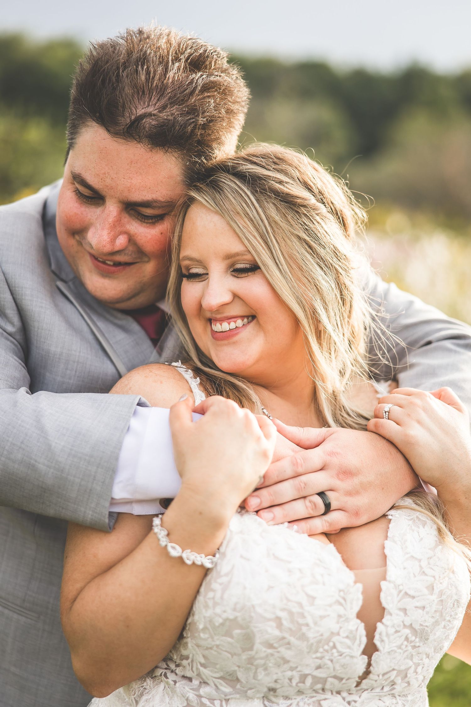 Candid moments of joy and laughter shared between a couple during their wedding photo session.