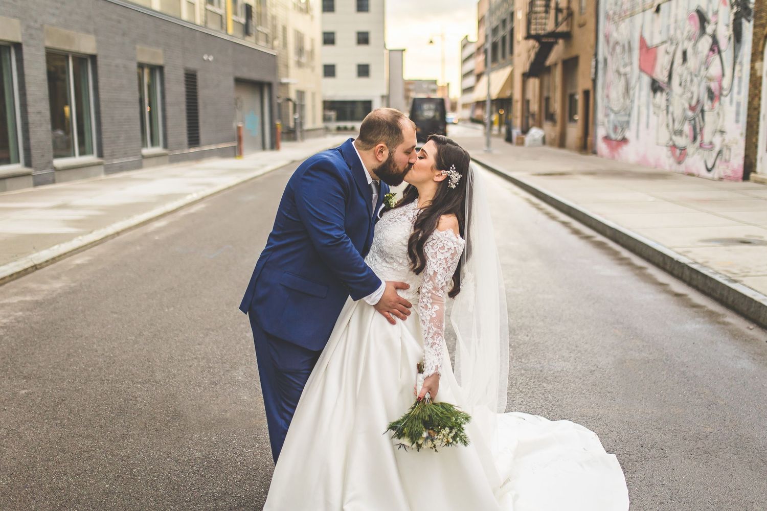 Panoramic wedding photo series showing tender moments between newlyweds in urban setting.