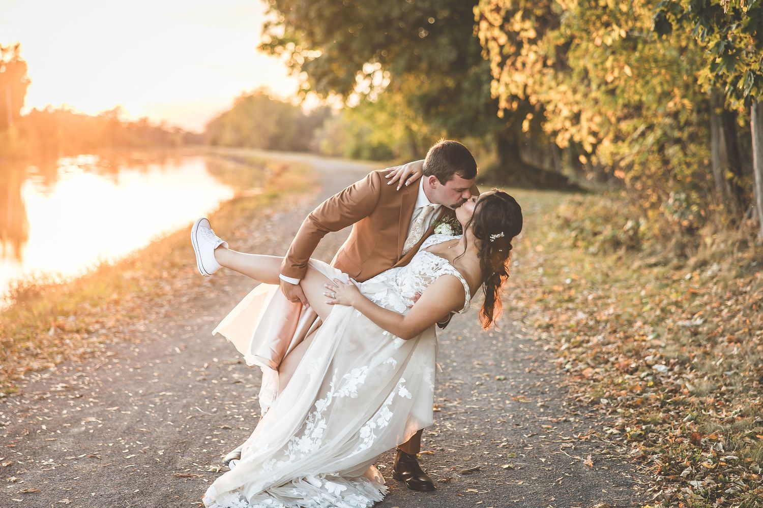 Artistic wedding photography sequence during sunset by the water.