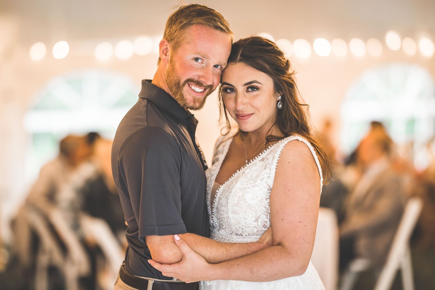 Romantic dance sequence showing tender moments between newlyweds at an evening reception.