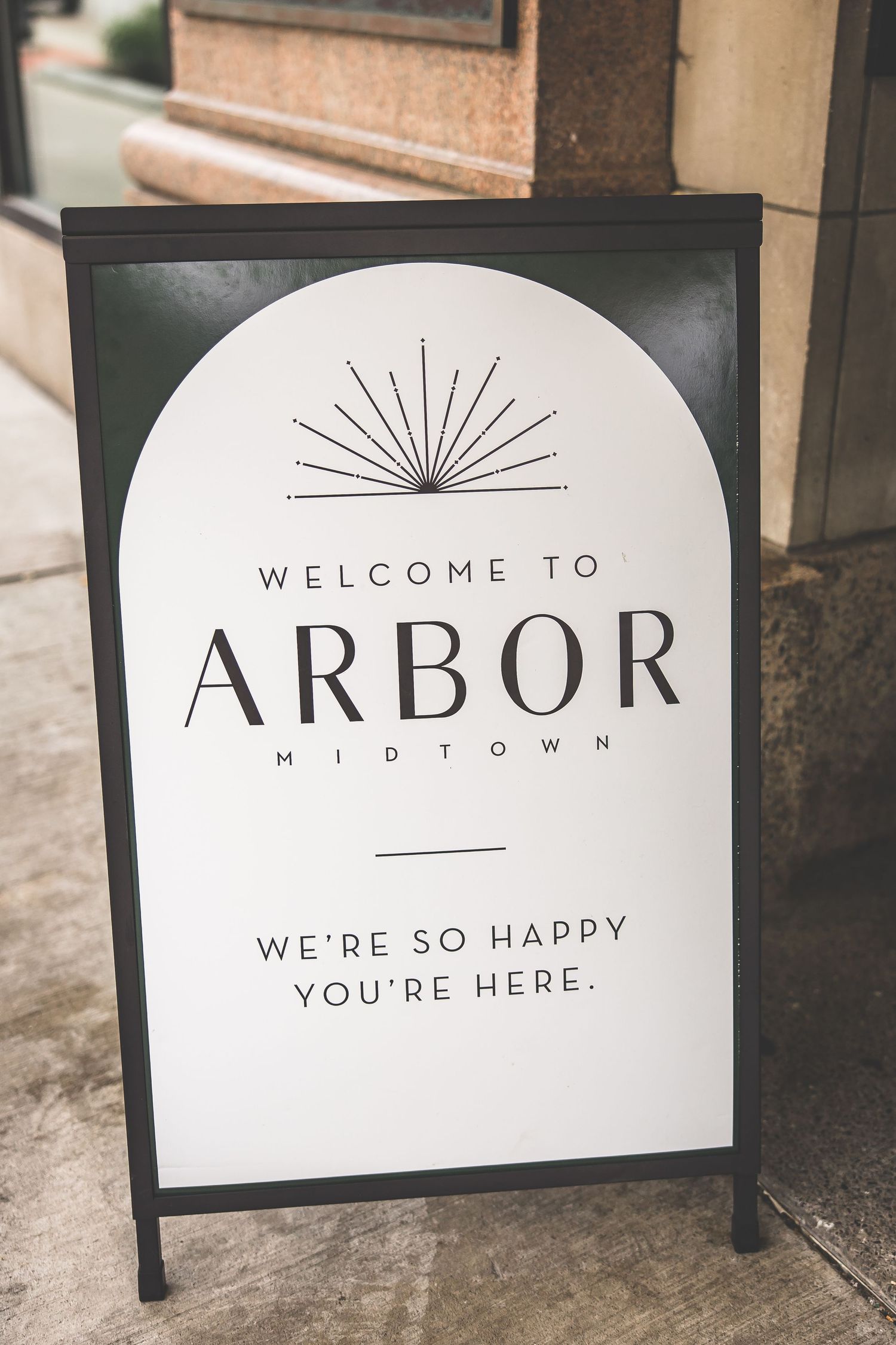 Modern minimalist welcome signs for Arbor venue with clean typography and design.