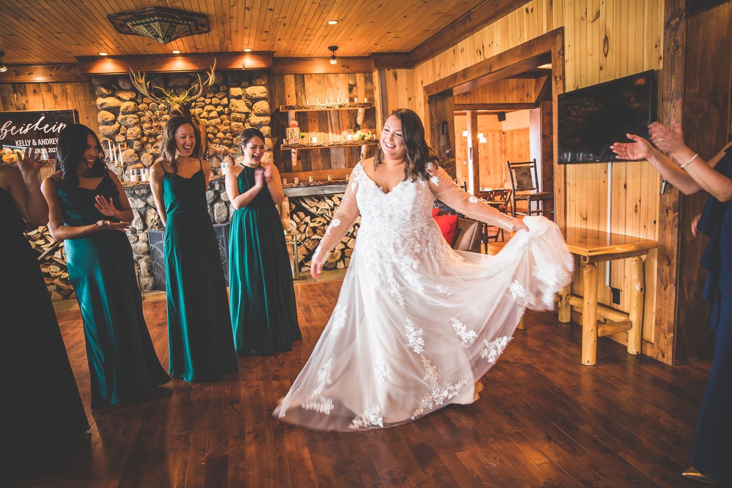 Wedding dance sequence in a rustic wooden venue with warm lighting.