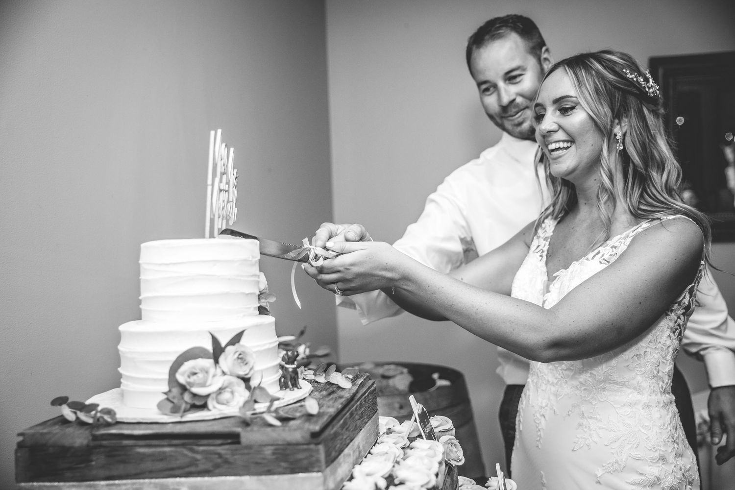 Wedding guests enjoying cake and desserts at an elegant reception.