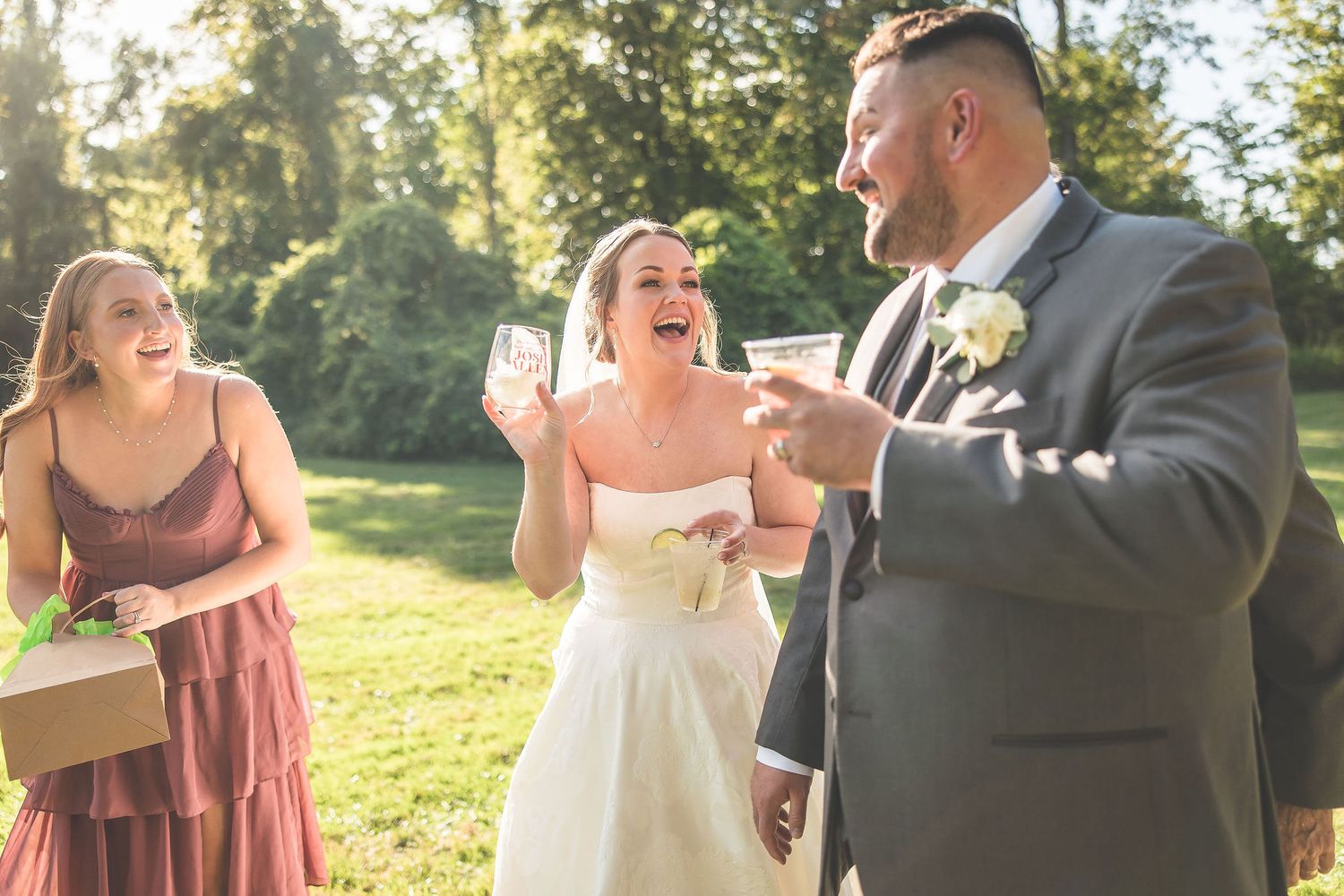 Joyful wedding celebration moments captured in golden afternoon sunlight.