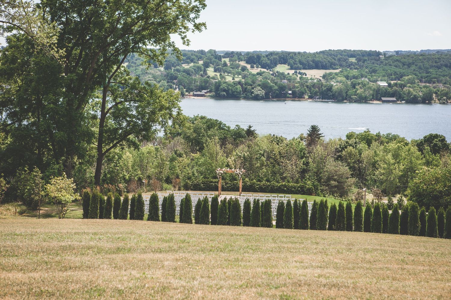 Scenic landscape view of rolling hills and waterfront from wedding venue.