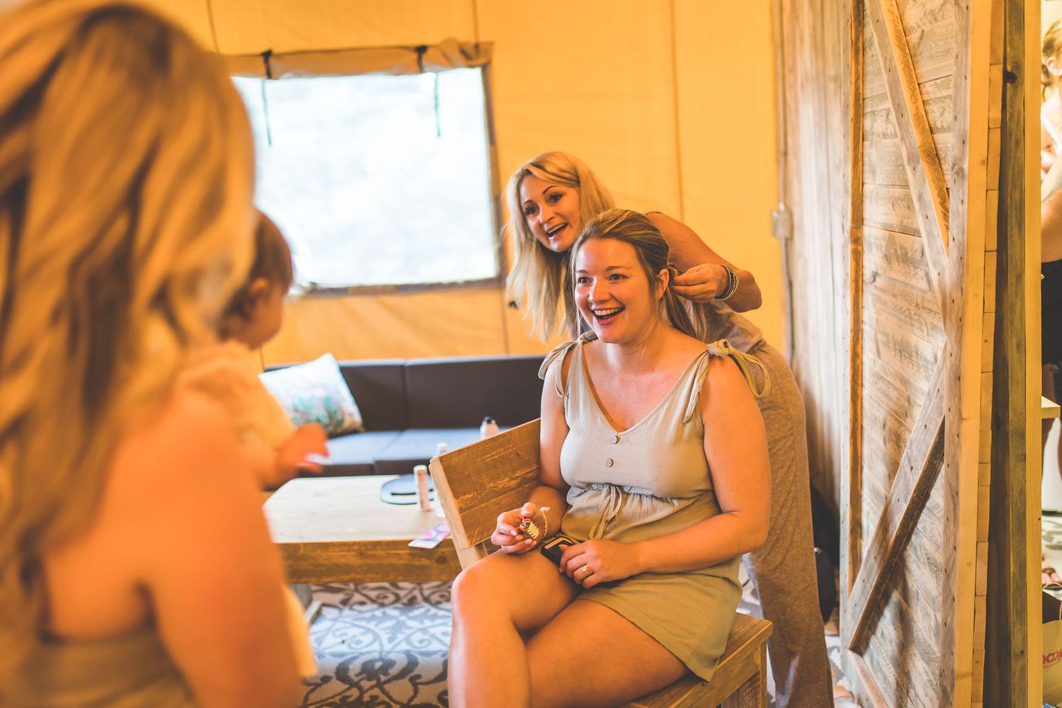 Warm-toned candid shots of wedding preparation moments in indoor venue.