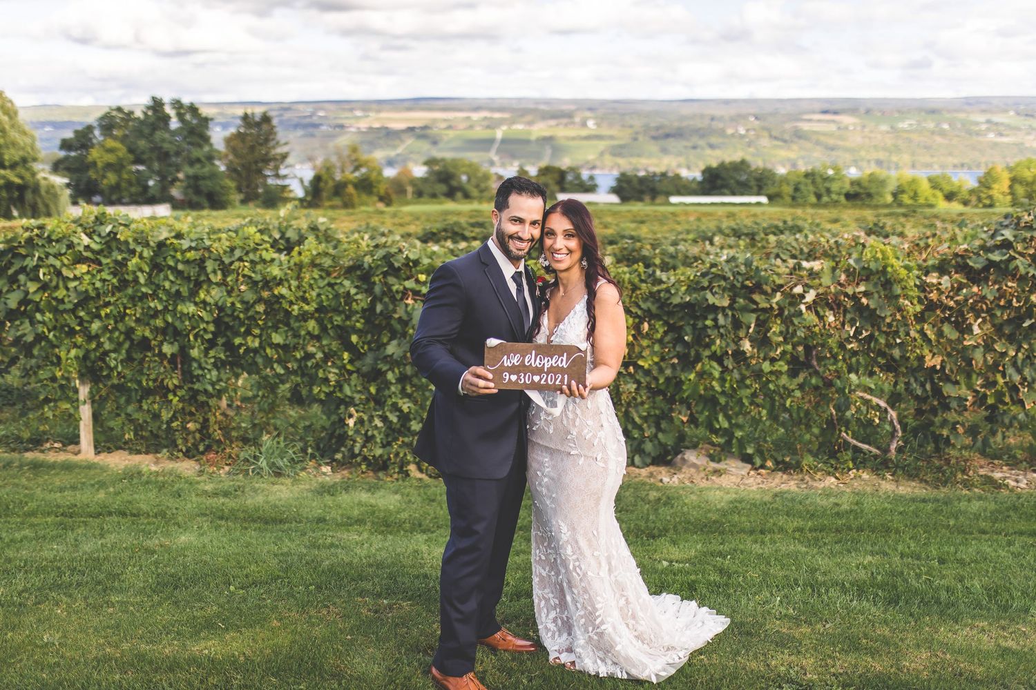 Wedding photography session in a beautiful hillside vineyard.