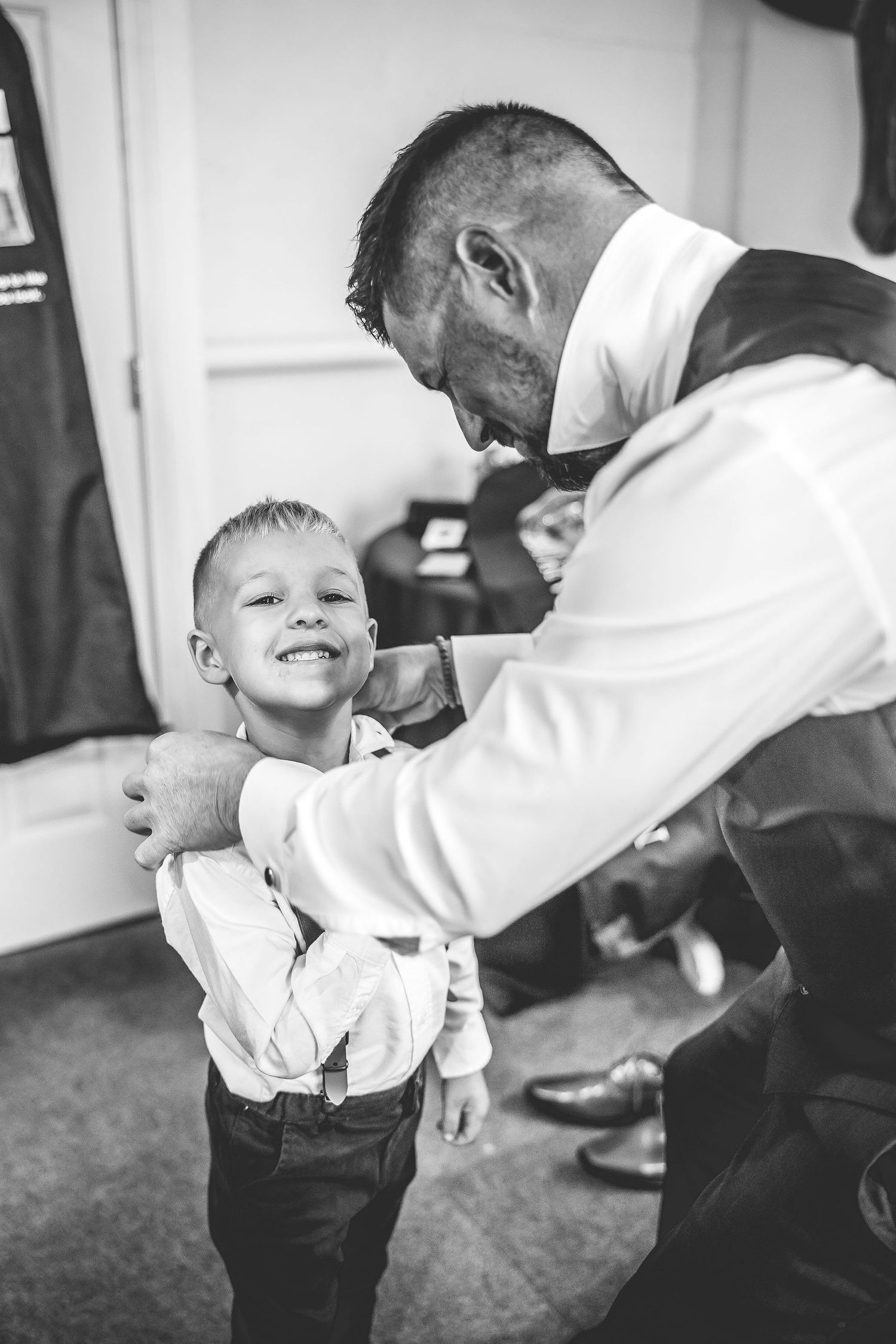 Wedding preparation details in rustic venue setting.