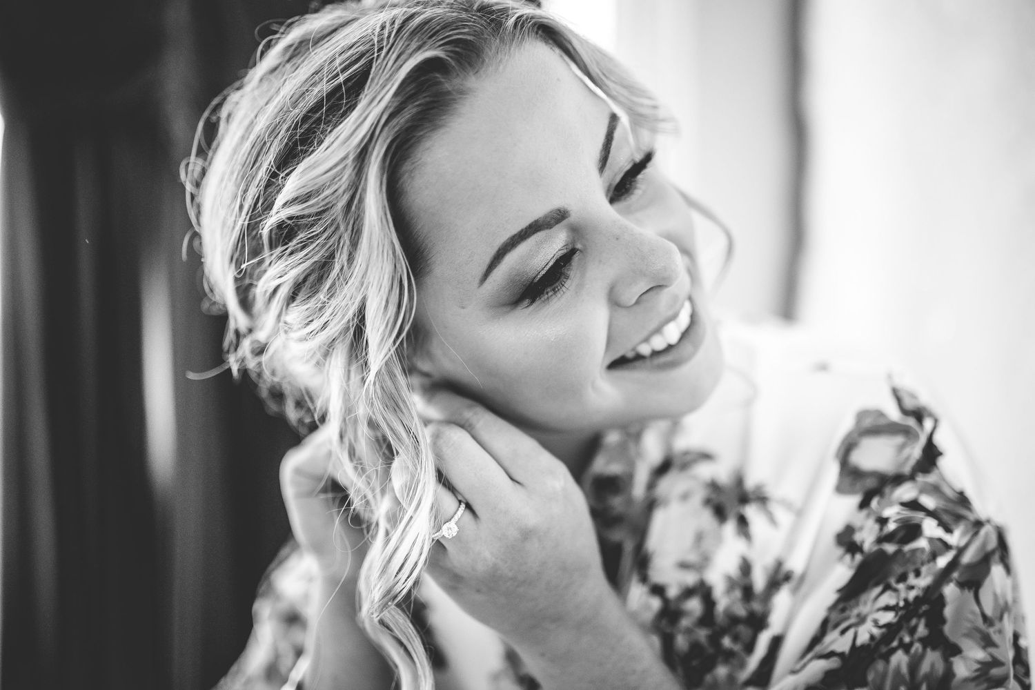 Black and white portrait series showing joyful expressions and emotions.