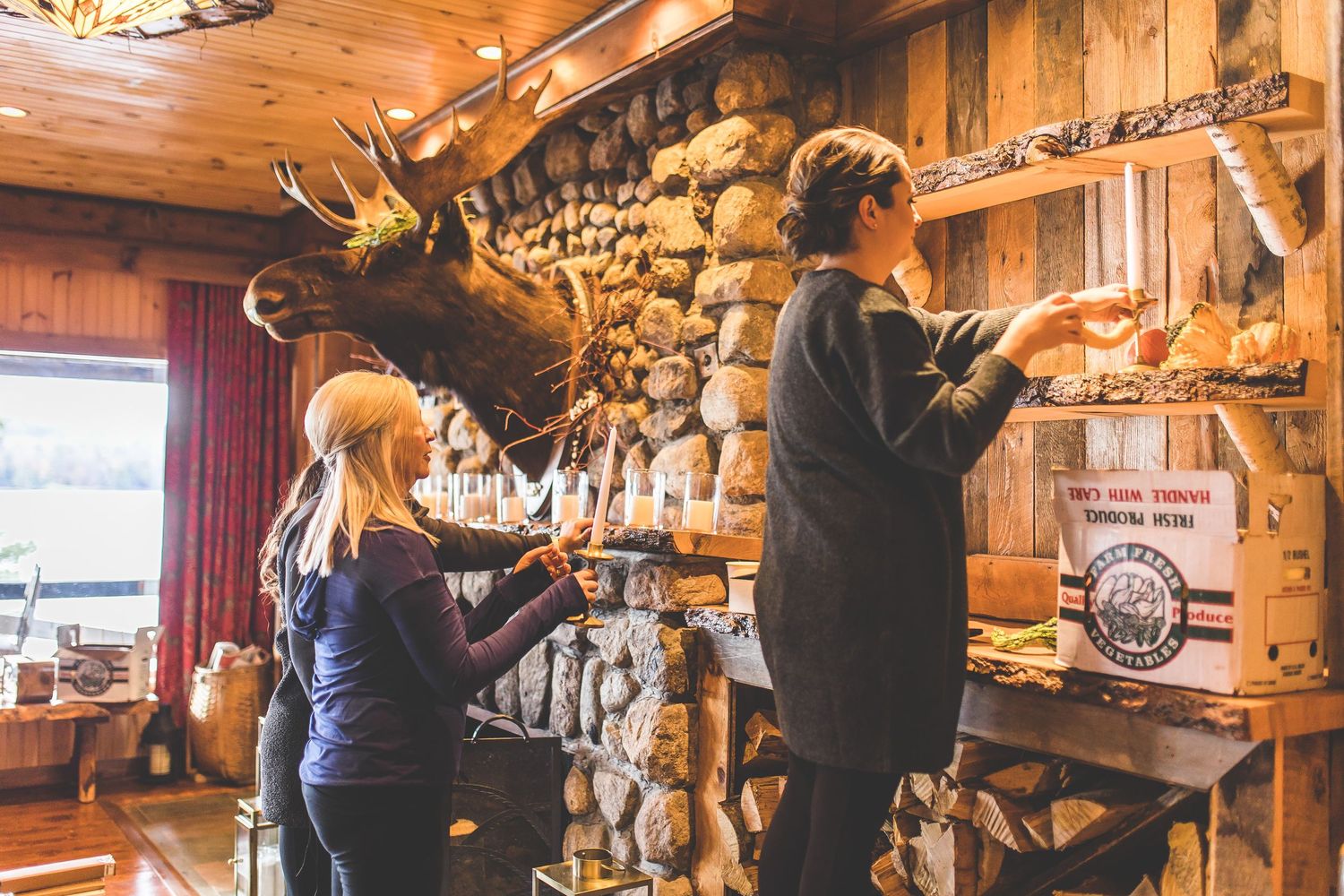 Rustic cabin interior decorated with vintage items and wooden accents.