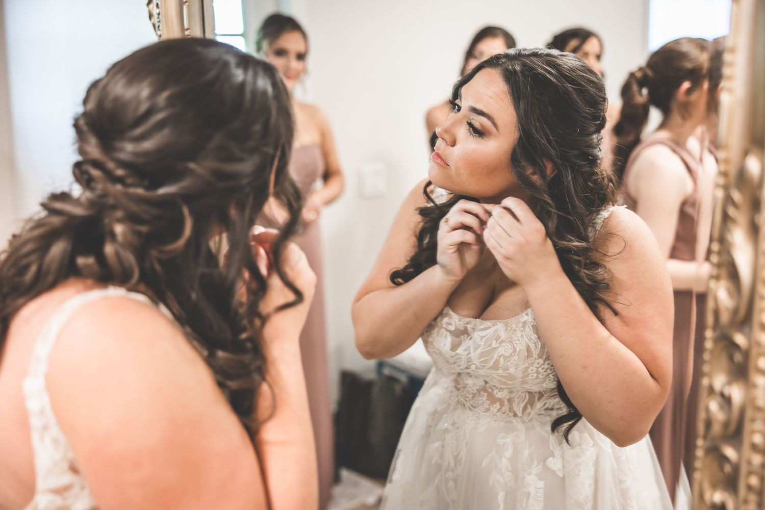 Wedding preparation moments captured in a bridal suite with elegant decor.