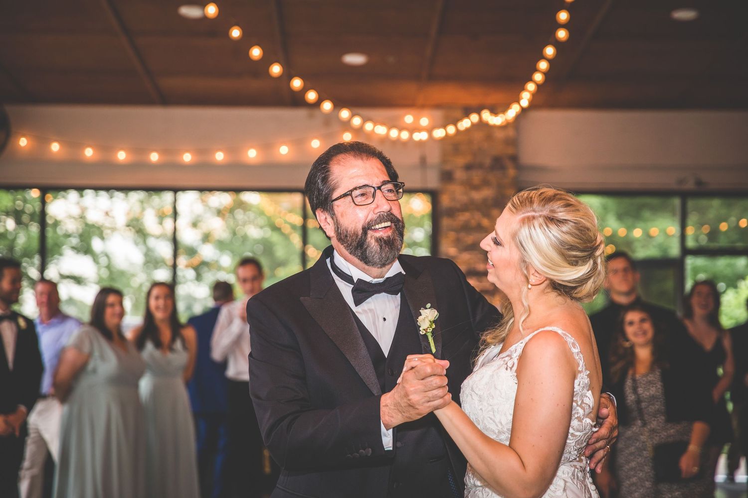 Couple sharing an intimate dance moment at their wedding reception.