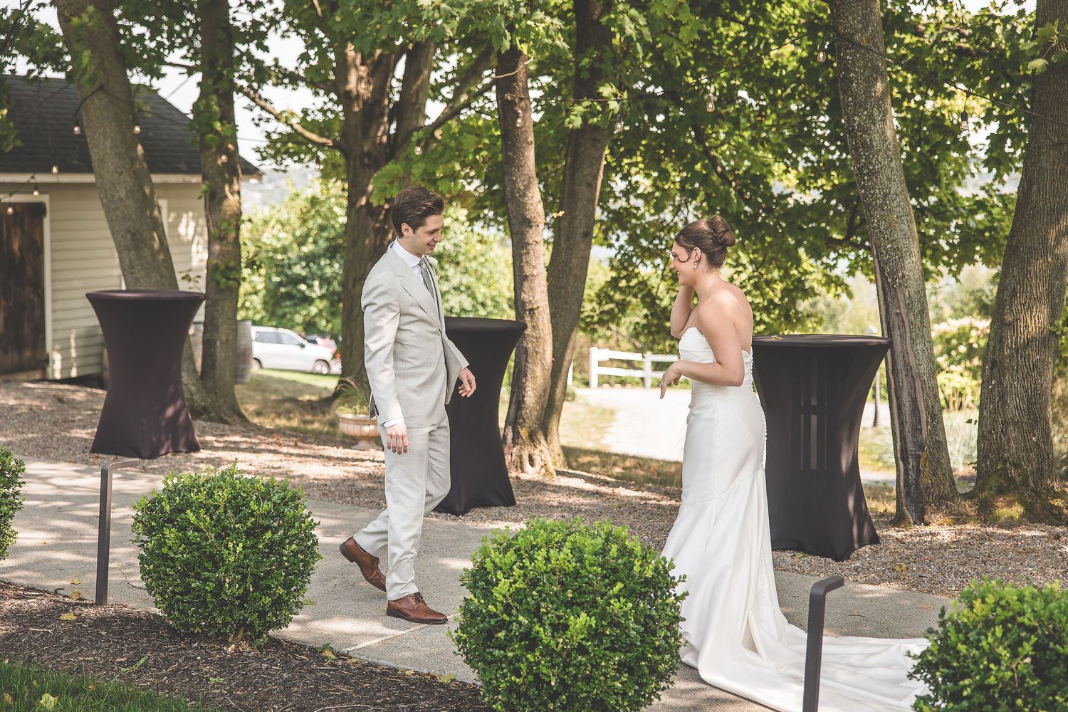 Wedding photo sequence showing tender moments on a tree-lined pathway near a garden.