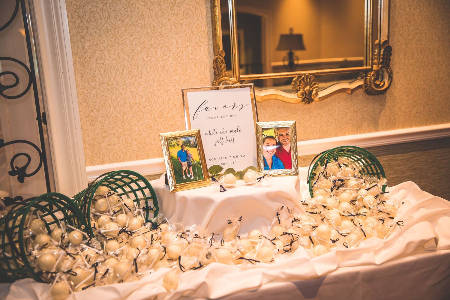 Wedding reception place cards arranged with delicate seashell decorations.