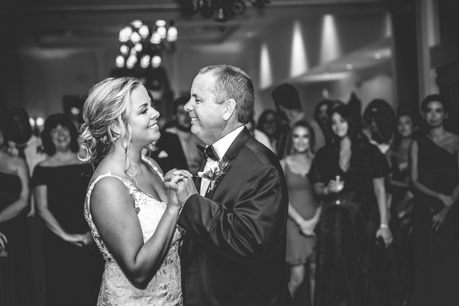 Black and white wedding reception photos capturing intimate dance floor moments.