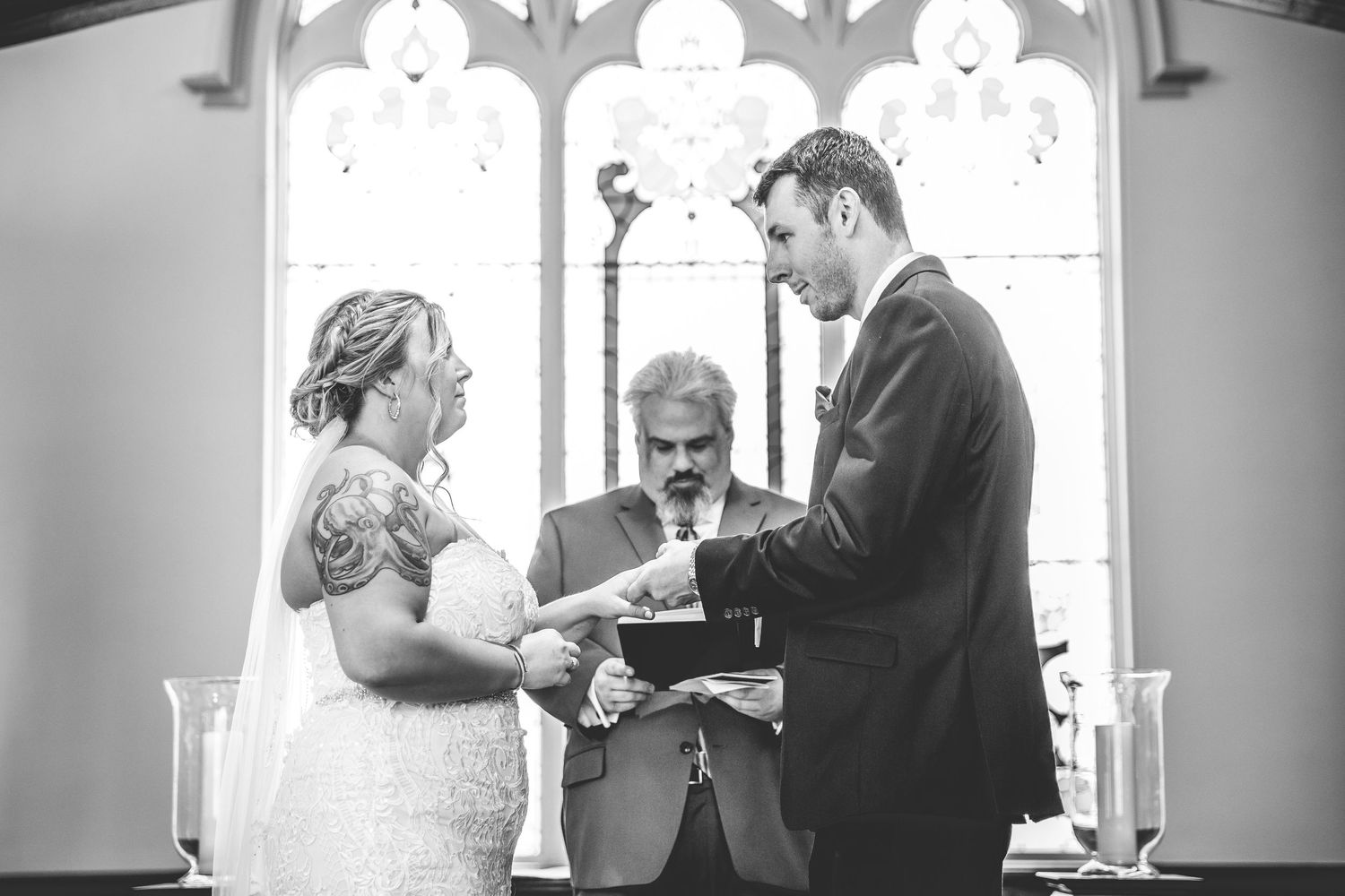 Black and white photo series showing tender moments during a church wedding ceremony.