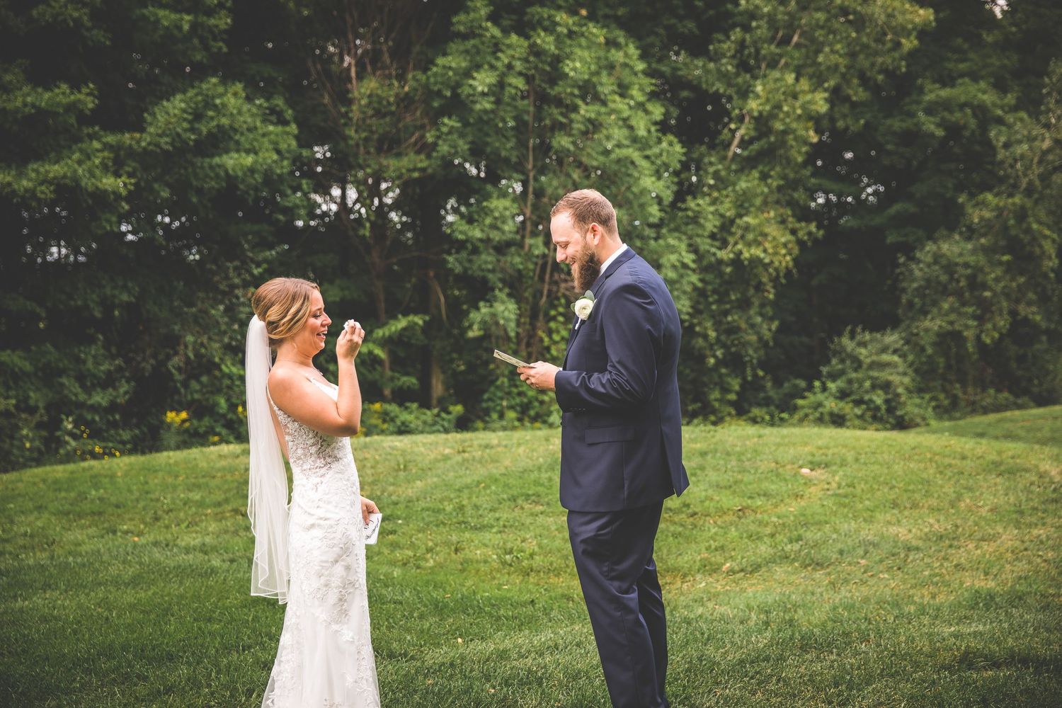 Emotional first look wedding sequence captured in beautiful outdoor setting.