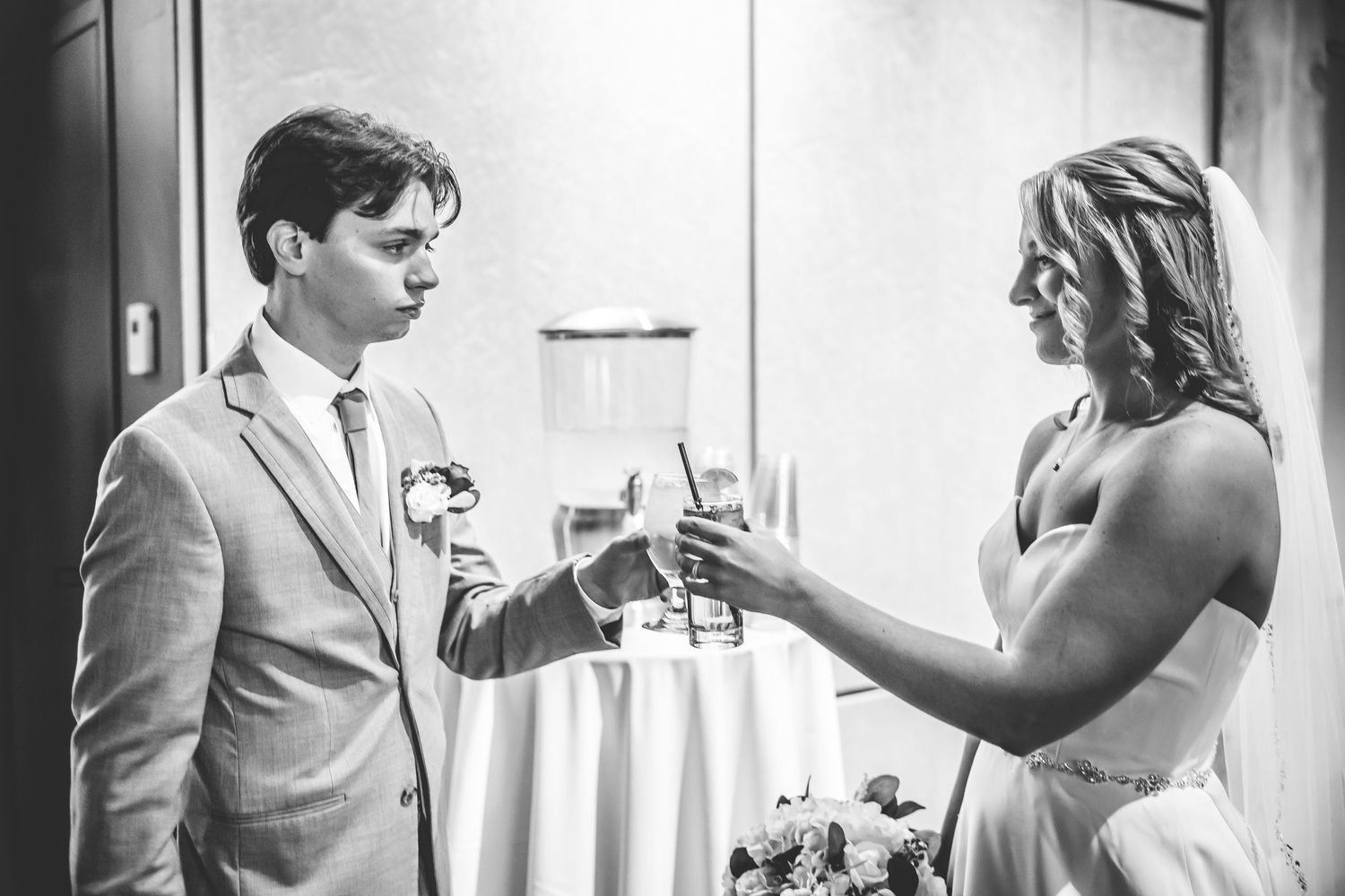 Black and white candid shots of wedding preparations and moments.