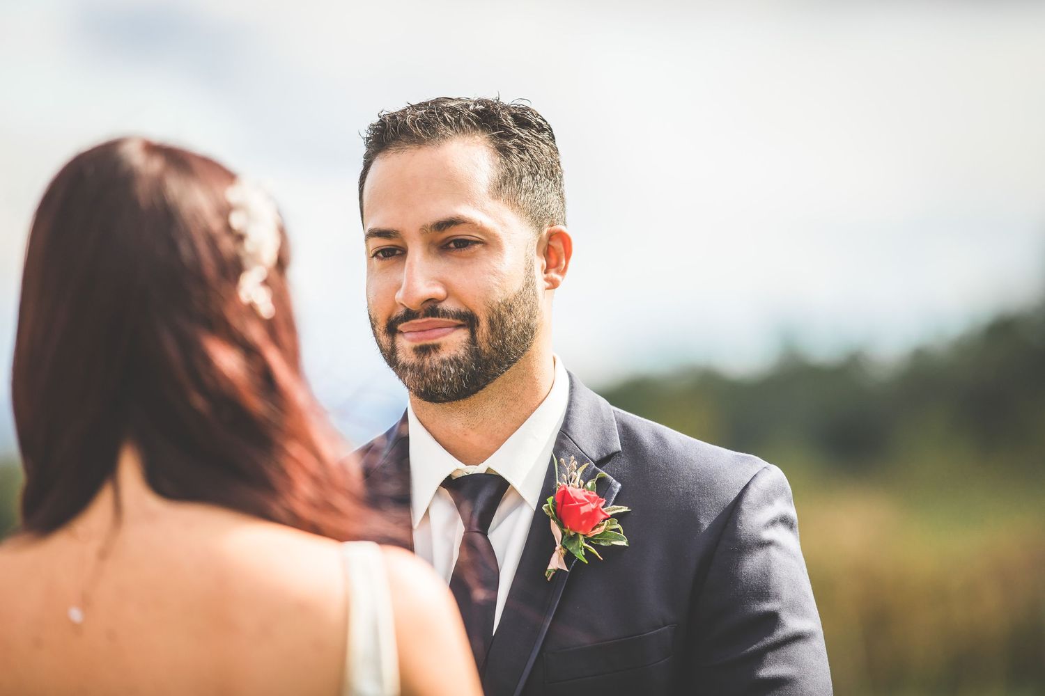 Close-up wedding ceremony moments captured in a series of candid photographs.