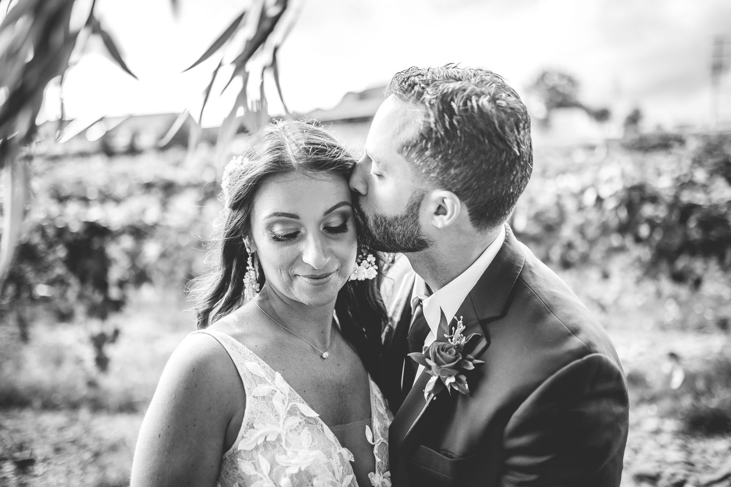 Artistic black and white wedding photos showing tender moments.