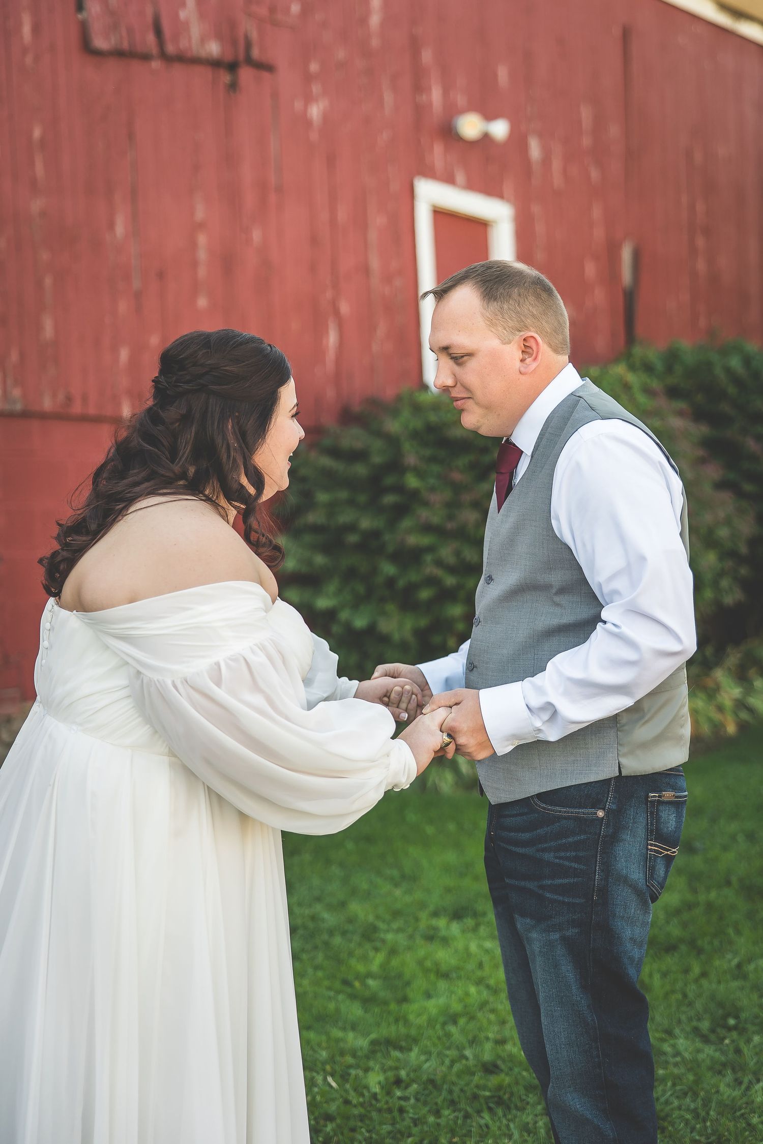 Sequence of romantic dance moves captured during outdoor barn wedding.