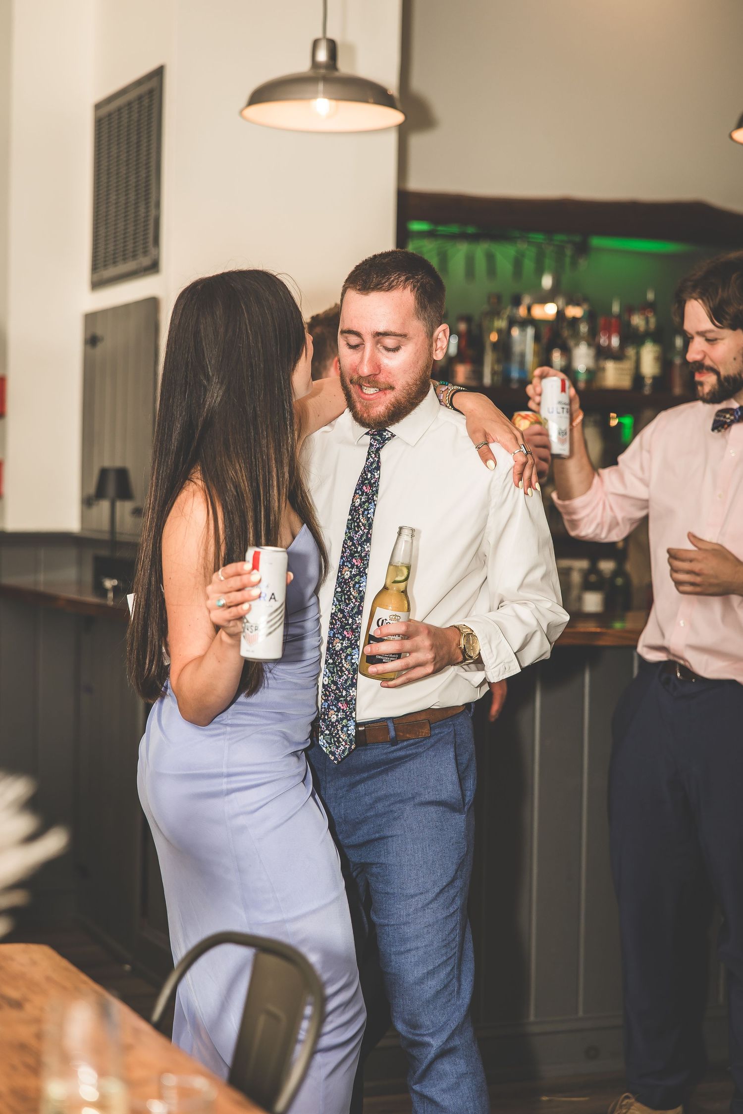 Couple dancing together in an intimate moment at their wedding reception.