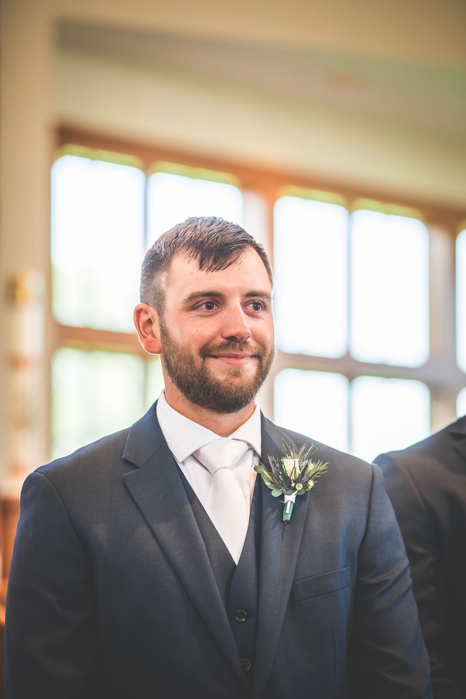 A series of close-up shots showing a groom's expressions during a wedding ceremony.