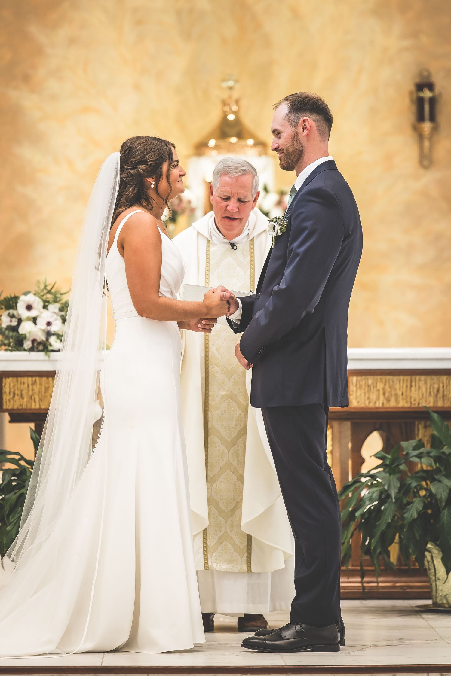 A series of intimate wedding ceremony moments captured at the altar in a church with warm lighting.