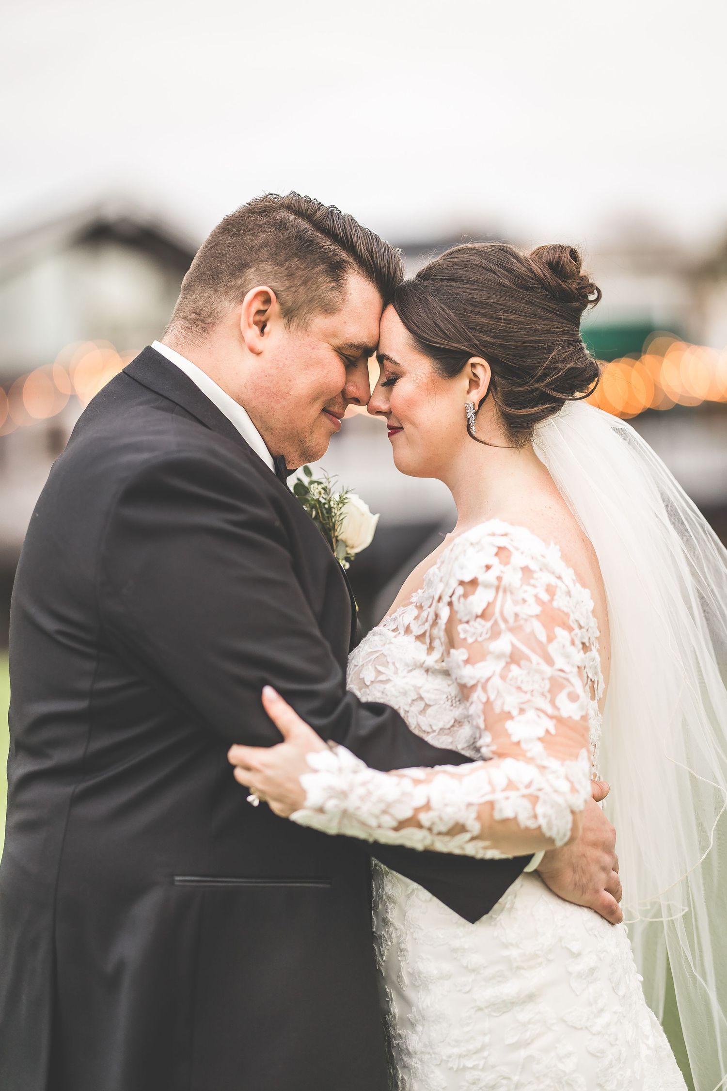 Intimate wedding portraits show couple in tender embraces outdoors.