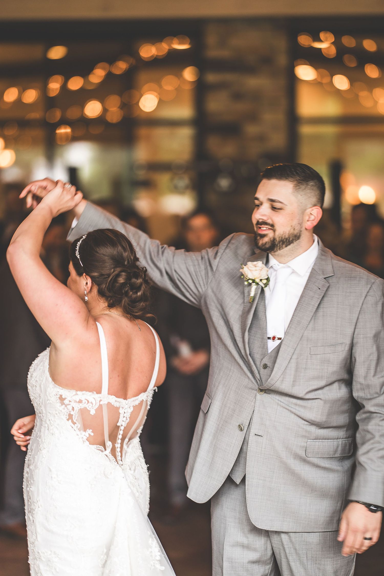 Couple dancing together in an intimate moment at their wedding reception.