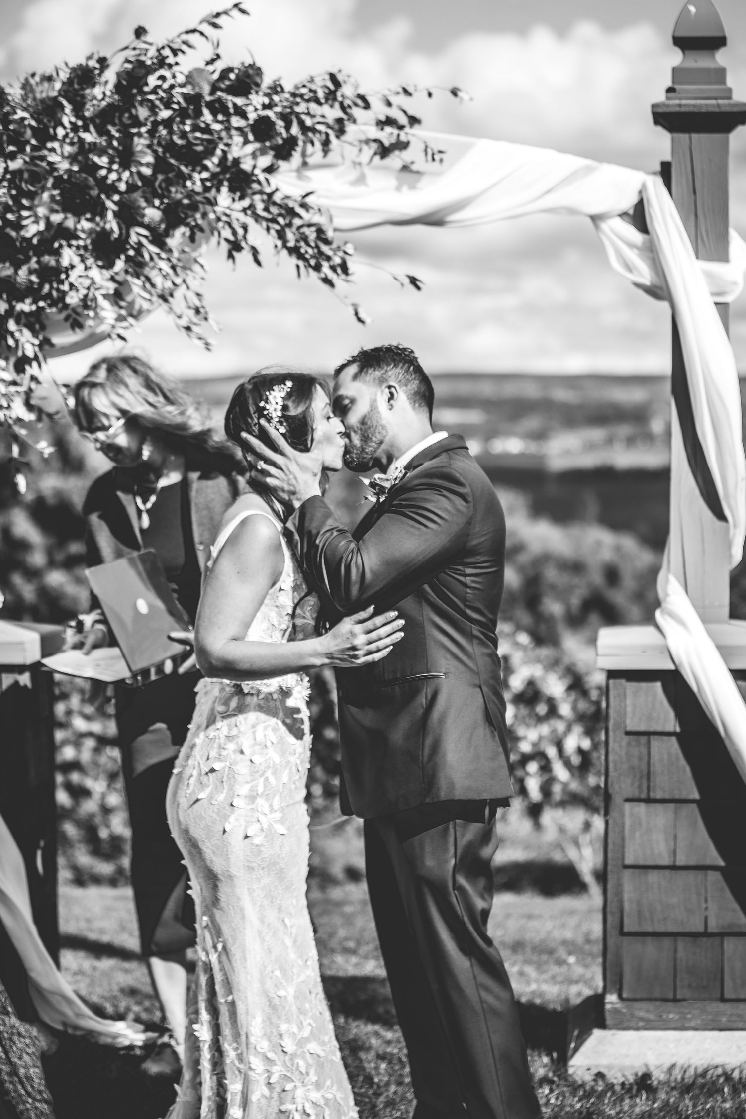 Black and white series showing emotional wedding ceremony moments.