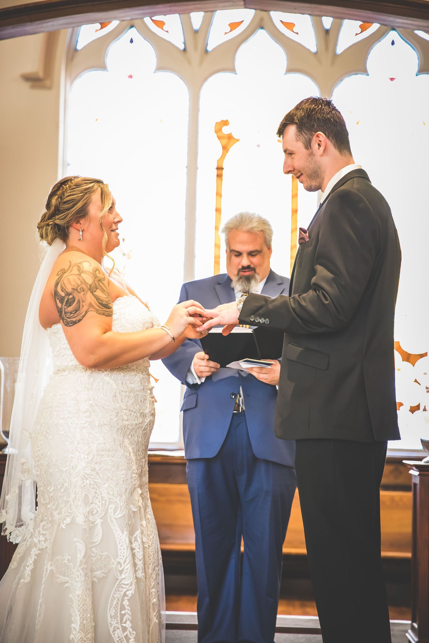 Sequence of intimate wedding ceremony moments captured in a traditional church setting with gothic windows.