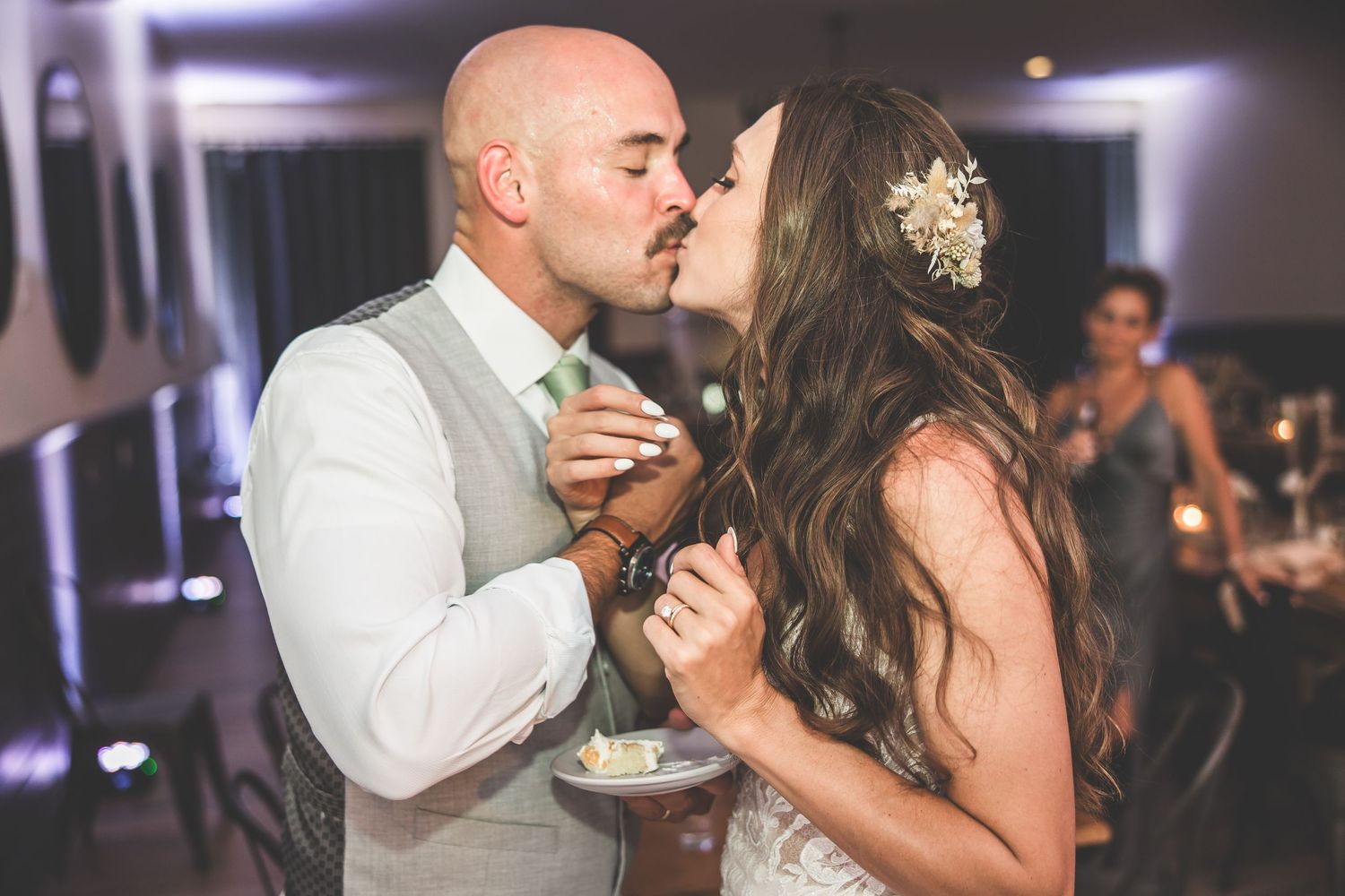 Wedding couple sharing a sweet moment on the dance floor at their reception.