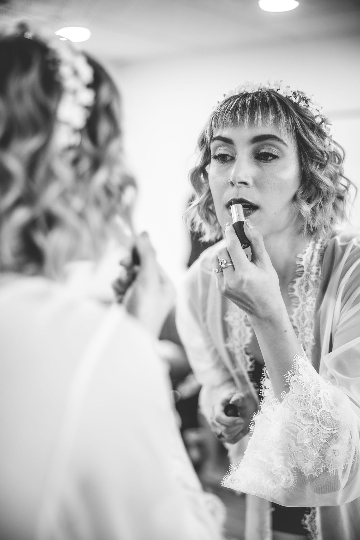 Black and white series of wedding makeup application shots.
