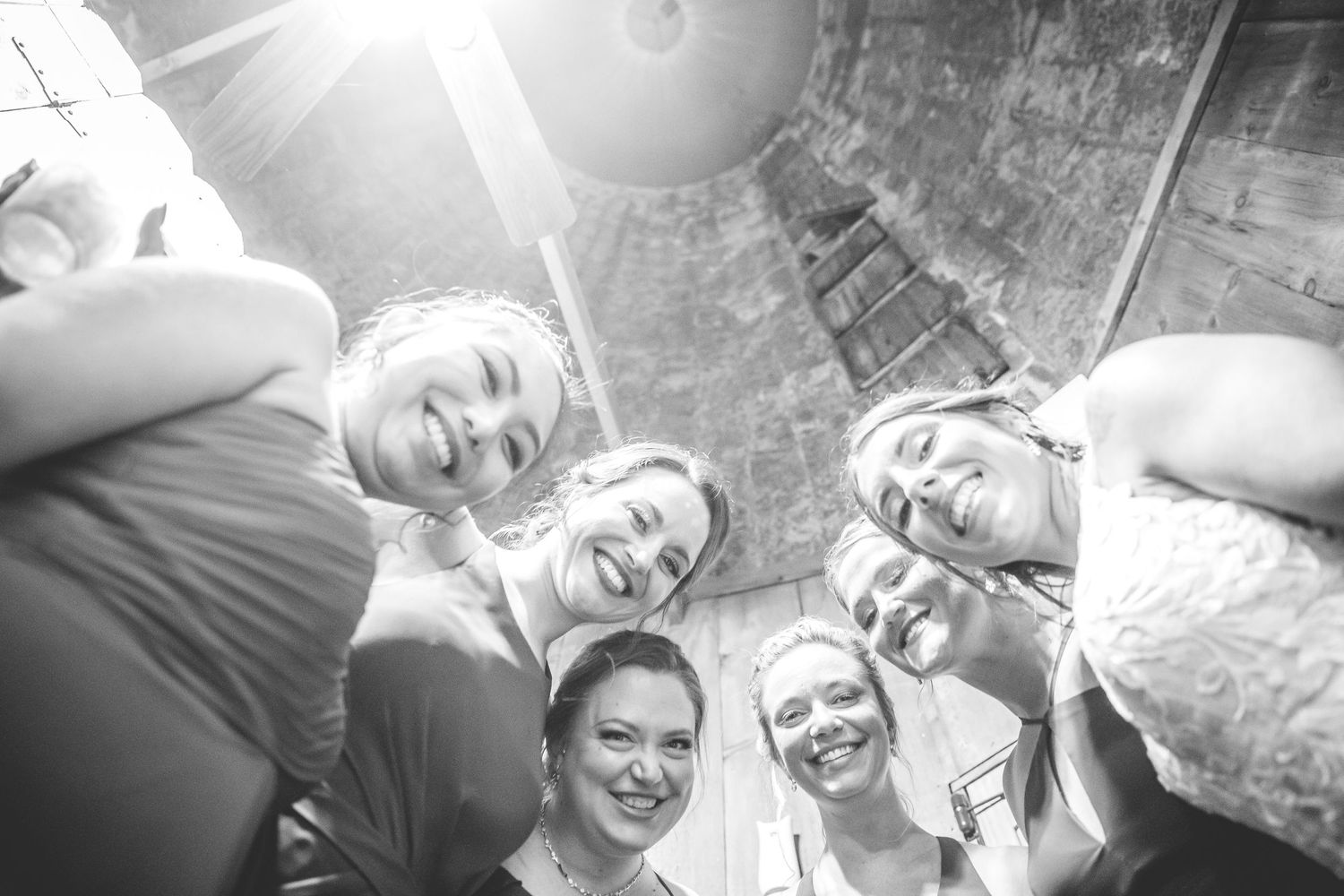Black and white candid group photos of wedding party members in natural light.