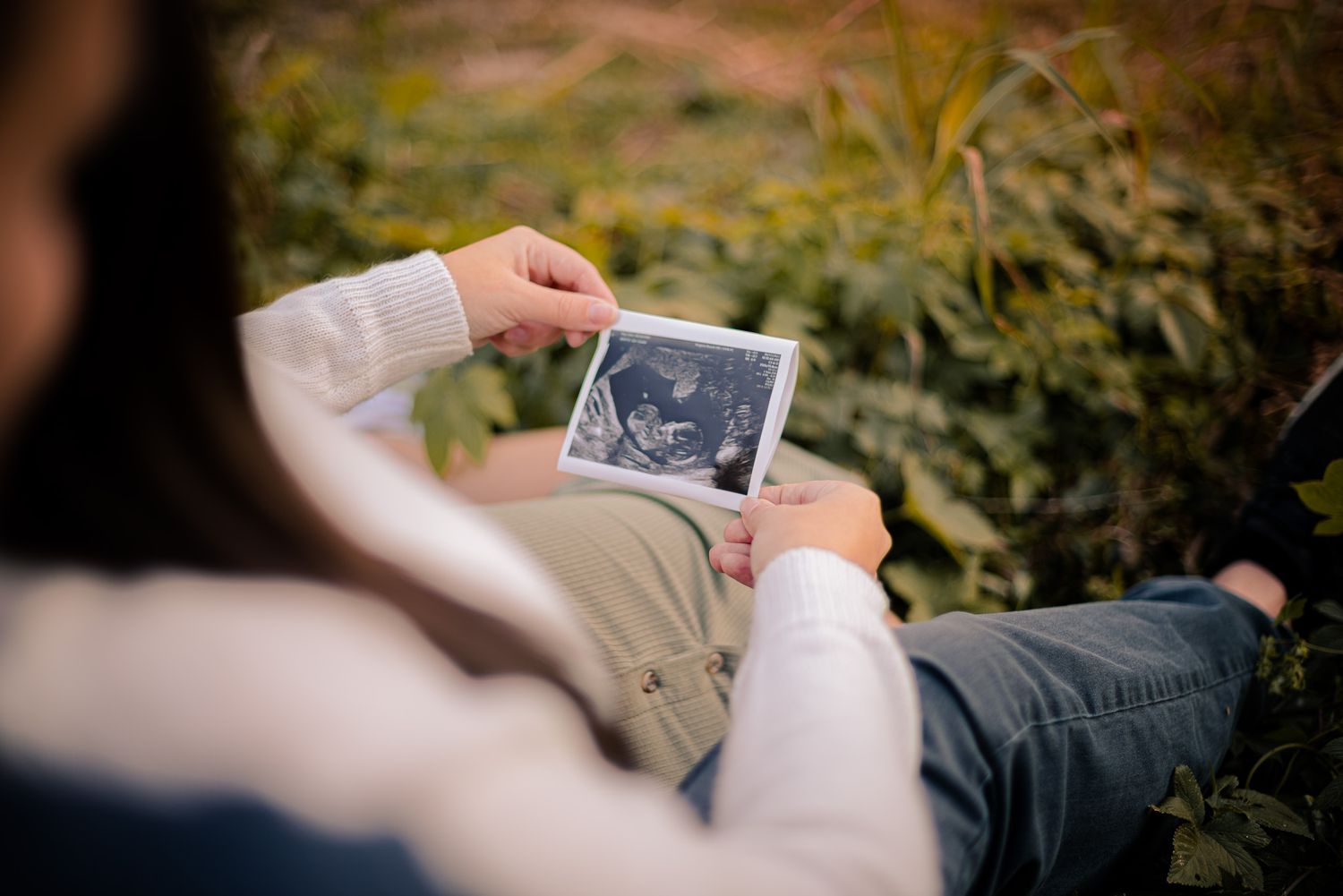 Intimate outdoor photography session in a natural setting.