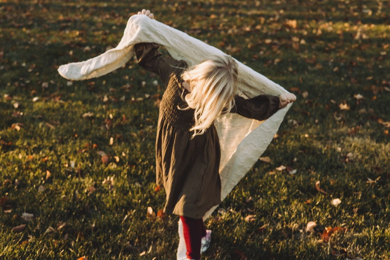 Golden hour outdoor photography showing flowing movement and dancing.