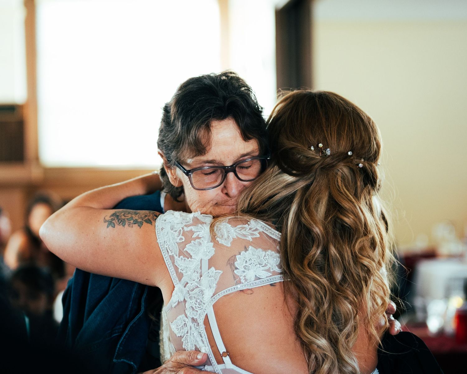 A romantic moment captured in a series of wedding photos showing a couple embracing during their special day.