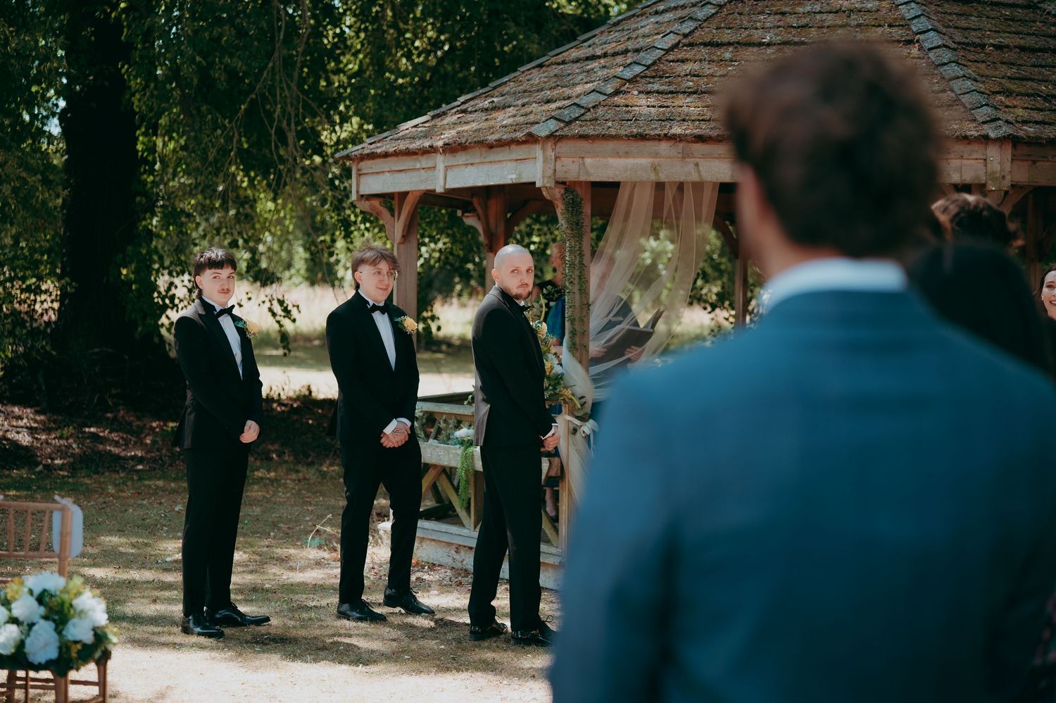 Outdoor wedding ceremony at Irnham Hall on a sunny July day