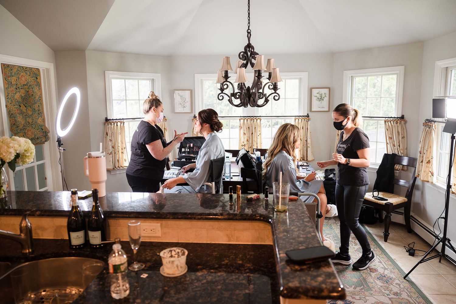 THe bride chose to get ready at her home, it was a bustling center of activity between the makeup artists and hair styli