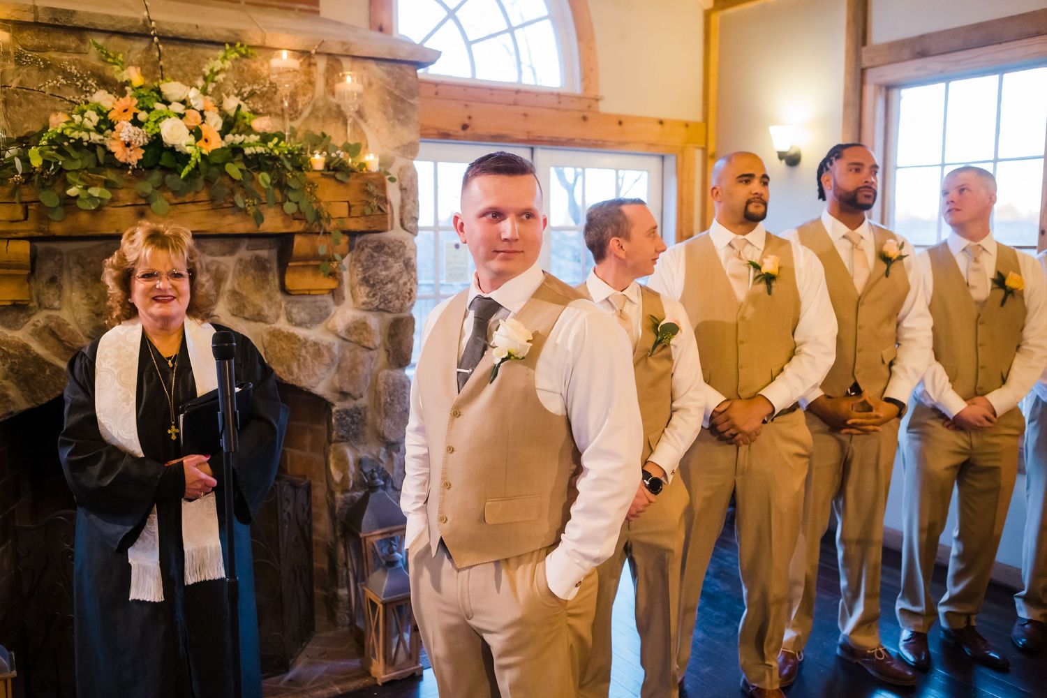 The groom eagerly awaits his bride at the start of the wedding ceremony at Pierce Hill Witch Hill