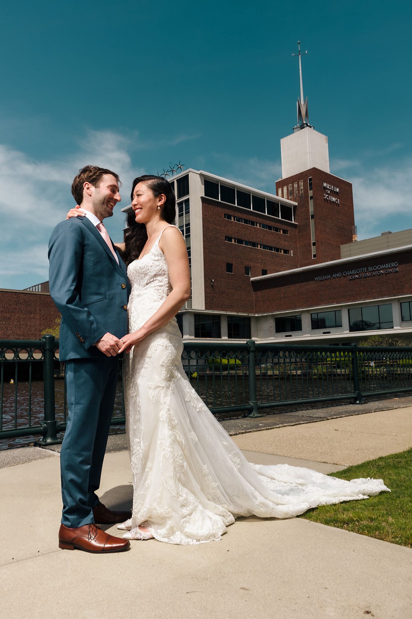 The newly married couple spent their wedding day walking around the Boston Museum of Science for the most romantic of po