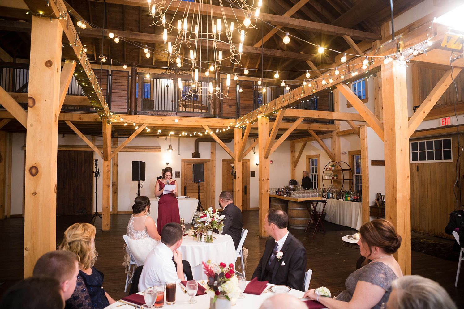 The maid of honor gives her speech at the wedding reception