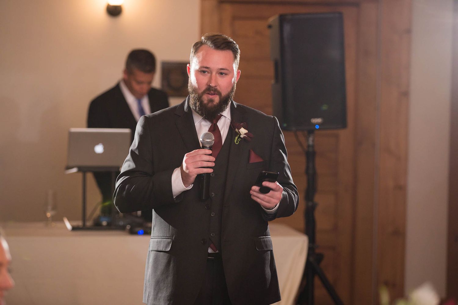 Best man gives his speech during the wedding reception.