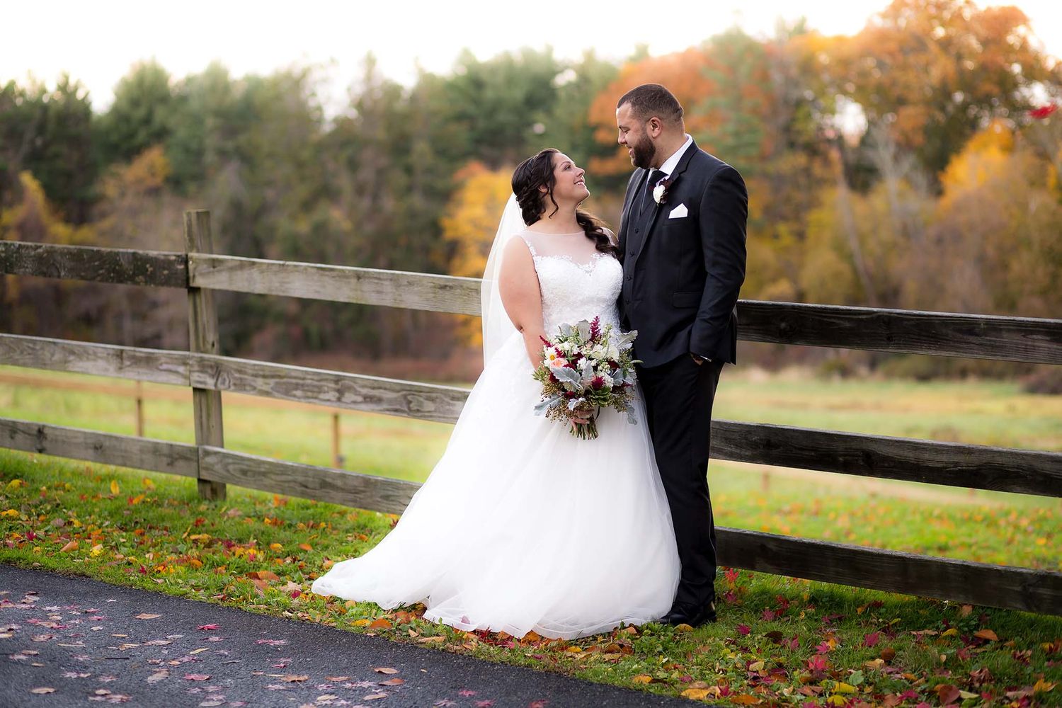 The bride looks into her new husband's eyes at Peirce Farm