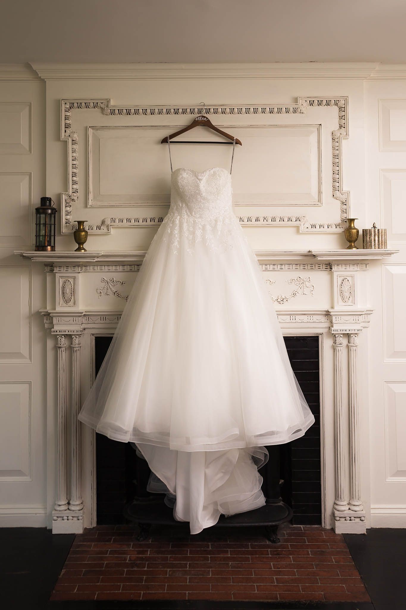The bride's wedding dress hanging up for all to see.