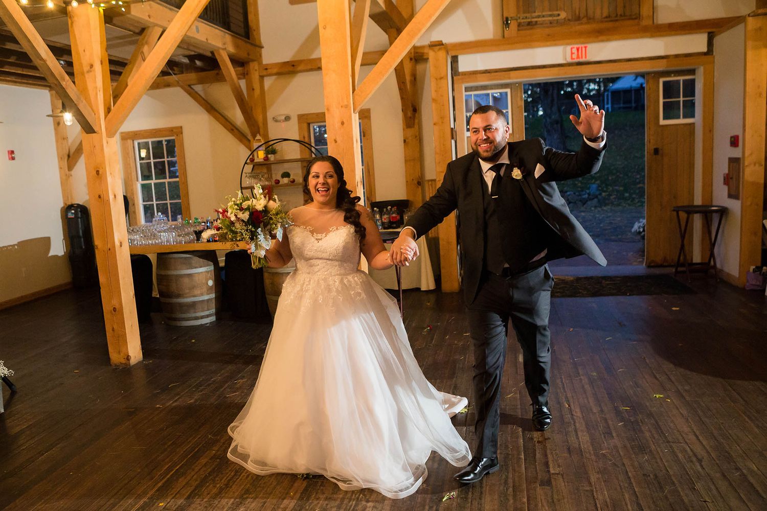 The bride and groom are announced to their wedding reception