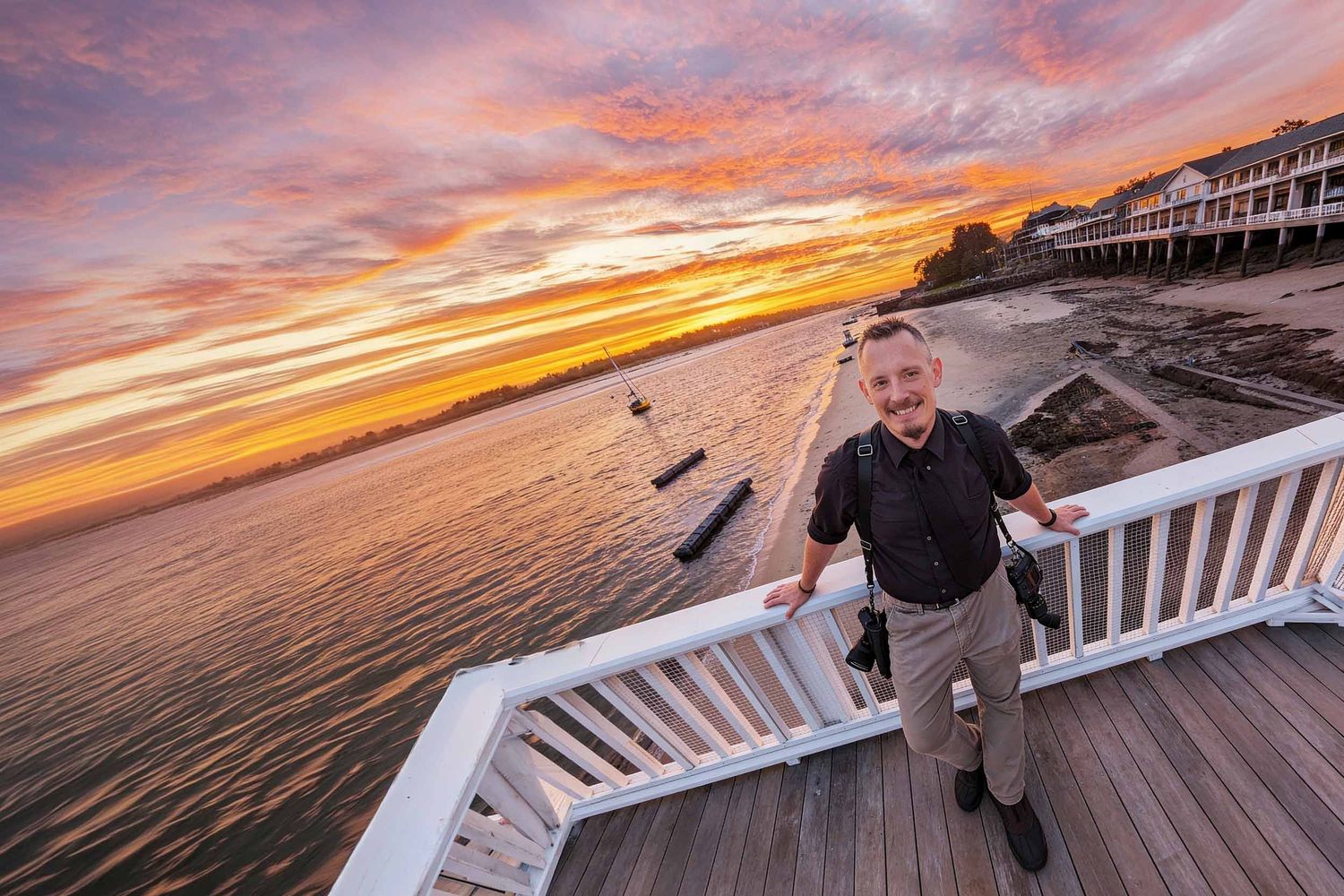 Wedding photographer capturing romantic couple portrait at Briar Barn Inn during sunset