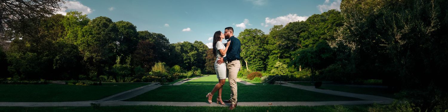 The engaged couple strike a dramatic and passionate pose during their engagement session at the Arnold Arboretum.
